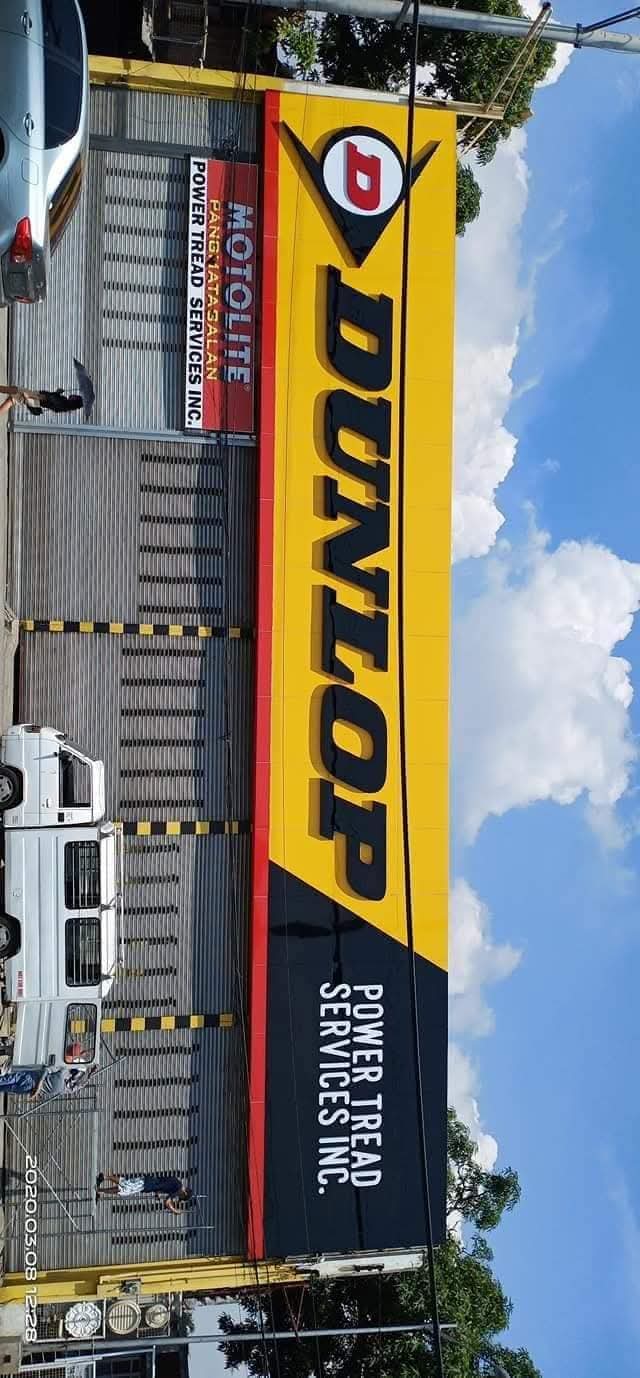 DUNLOP Power Tread Services Inc. Facade Signage